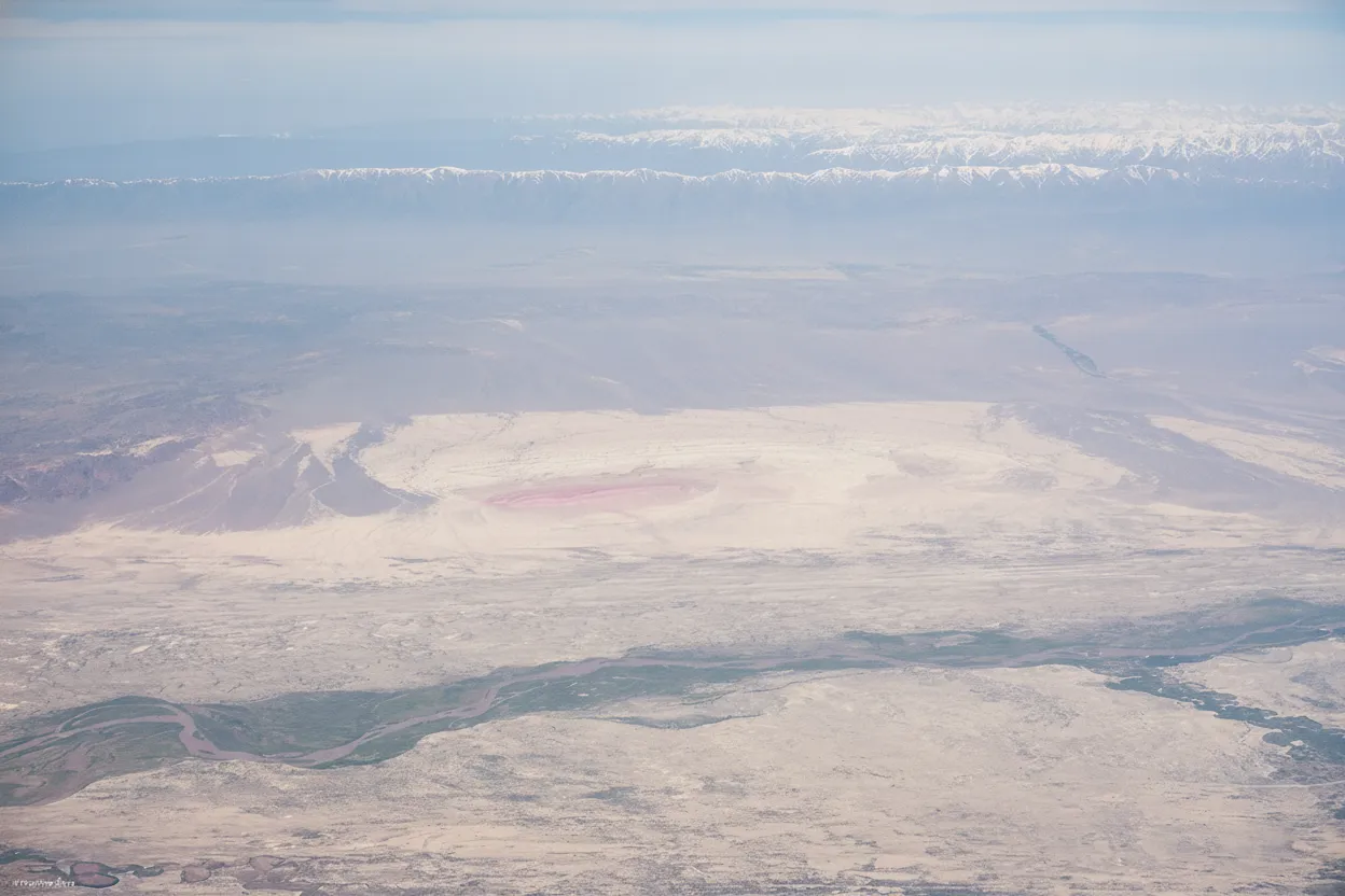 Panoramic view of the Aktau Mountains showing their vast scale and colorful layers