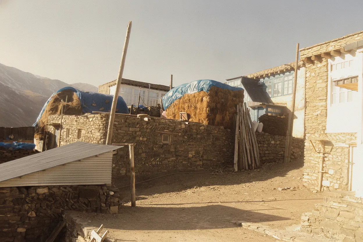 Close-up of traditional stone houses in Khinalug, Azerbaijan, showing intricate construction and narrow pathways between buildings.