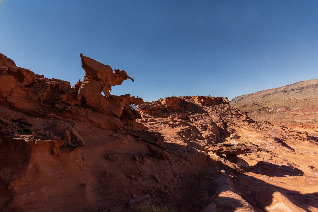 Intricate red sandstone formations at Little Finland glowing under the desert sun.