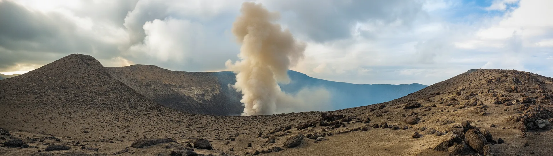 Tourists safely observing a fiery eruption at Mount Yasur volcano at sunset, Vanuatu