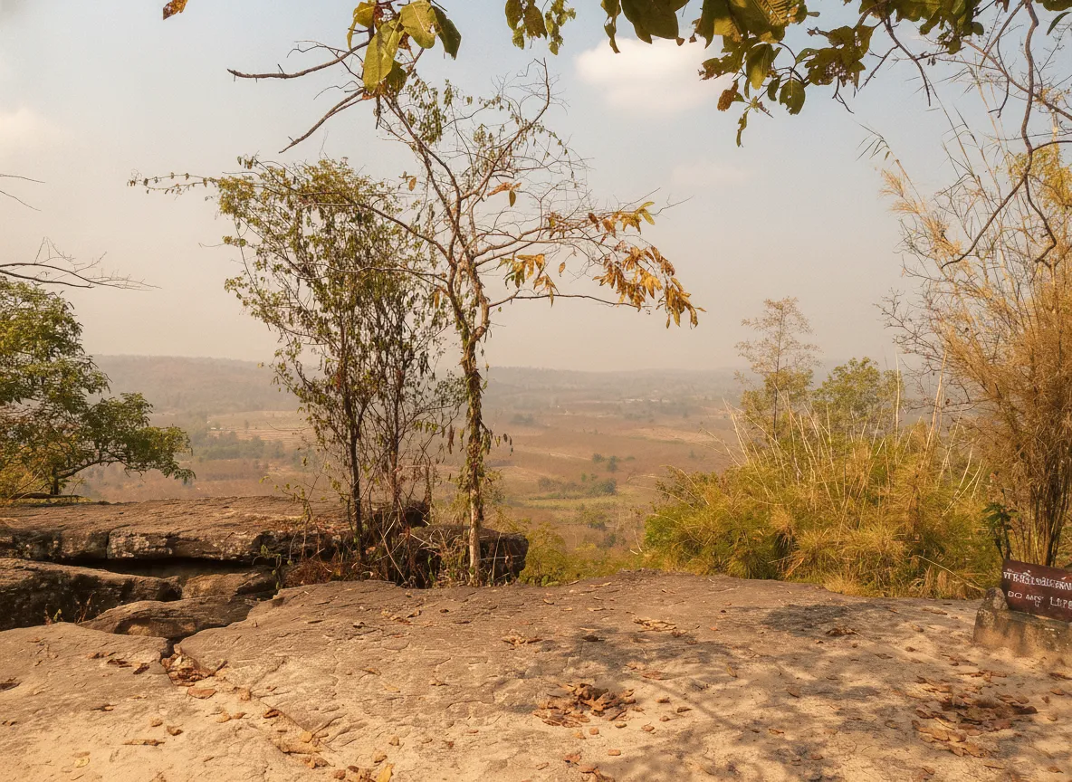 Imagine a surreal landscape where colossal sandstone pillars shelter prehistoric cave art and centuries-old Buddha images, revered as a sacred site hidden in plain sight.