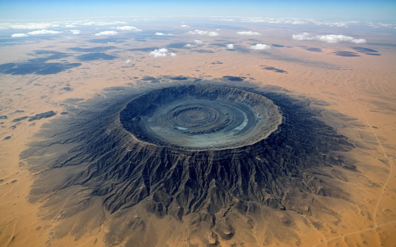 Aerial view of the Richat Structure, showing its distinct concentric rings in the Sahara Desert