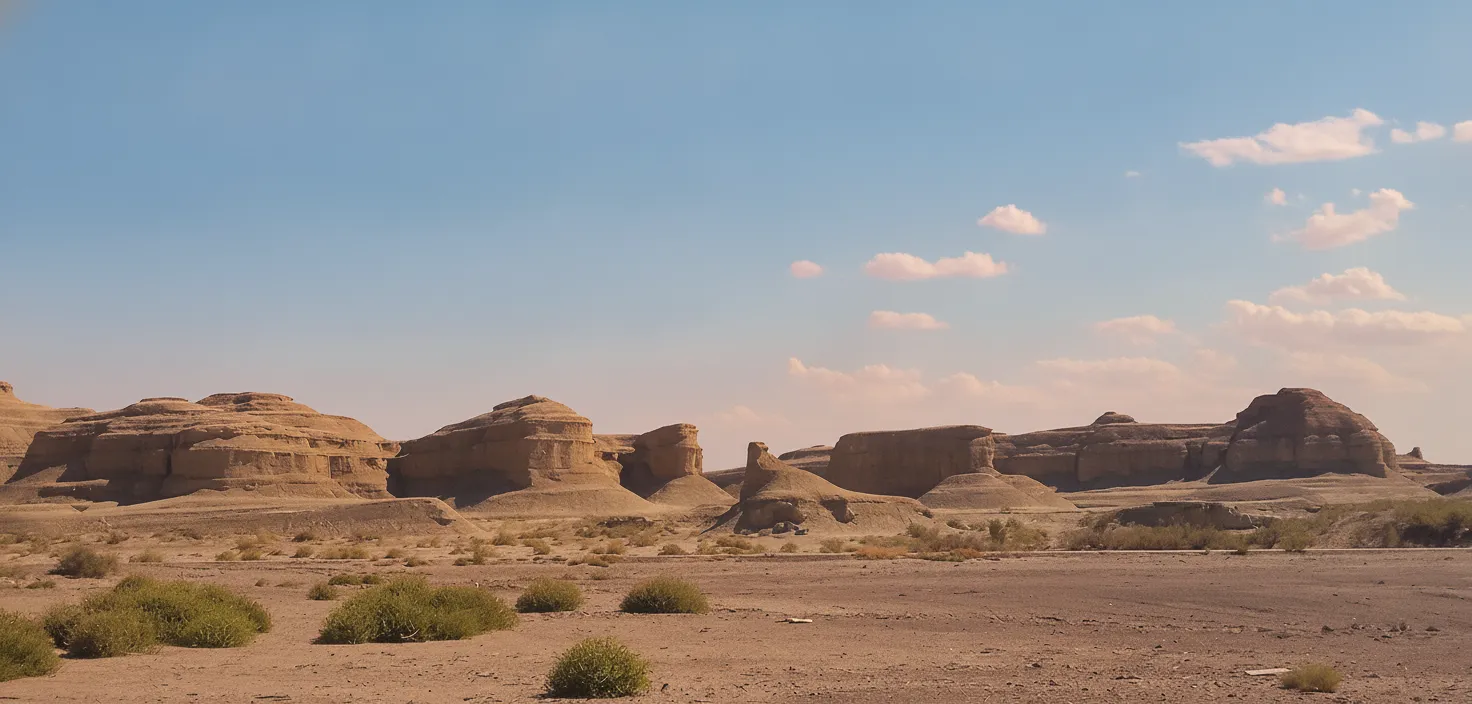 Sunset over Urho Devil City, with Yardang formations glowing in vibrant orange and red hues under a dramatic, colorful sky, emphasizing the magical transformation of the landscape.